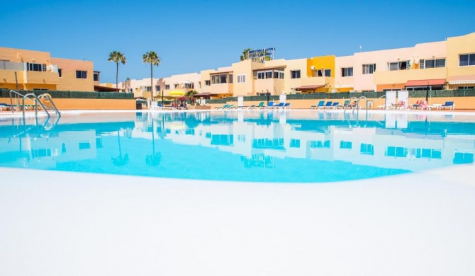 Family Apartment Delfines in Heart of Corralejo- Only 1 min to Sea, with Pool & Free Wifi by Holidays Home