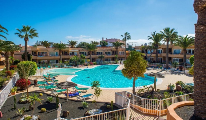 Corralejo Dunes Apartment "Tropical" with Pool & Wifi- Only 300m to the Beach by Holidays Home