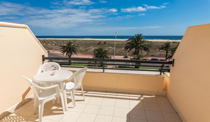 Palm Garden with sea views to the beach, pools